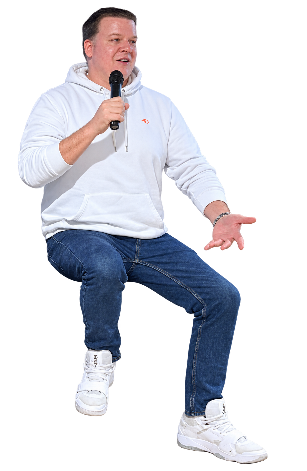 Nick LeRoy speaking into a microphone